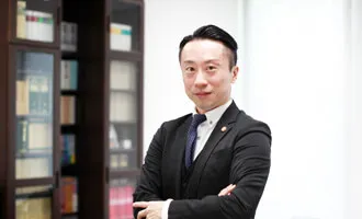 弁護士吉岡津